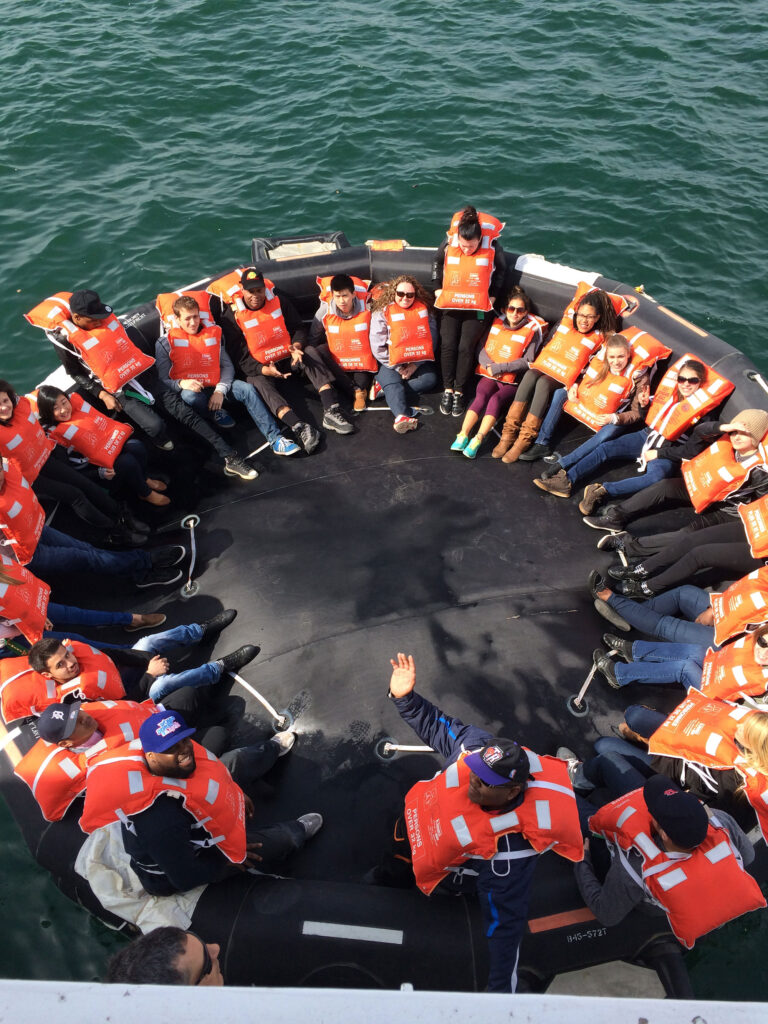 Large number of individuals in a large round inflatable