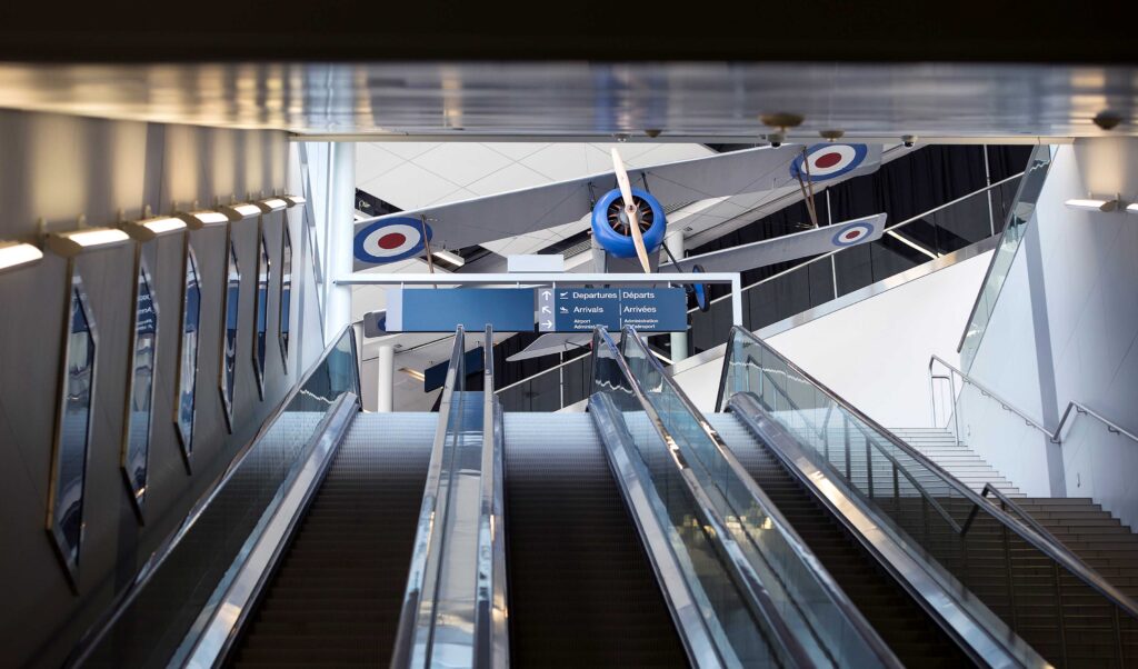 Escalator up from the pedestrian tunnel to the lobby