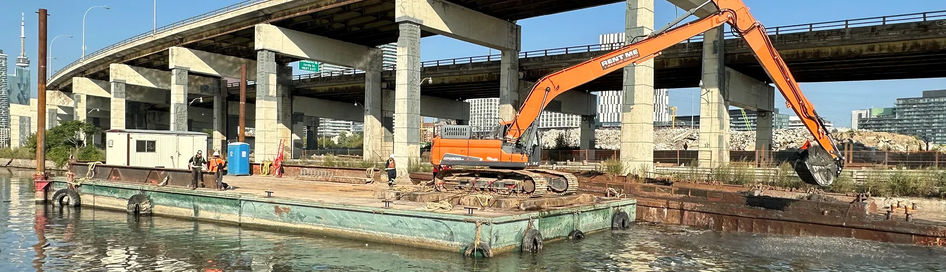 Dredging ship and excavator photo